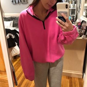 Neon pink quarter zip with toggle bottom